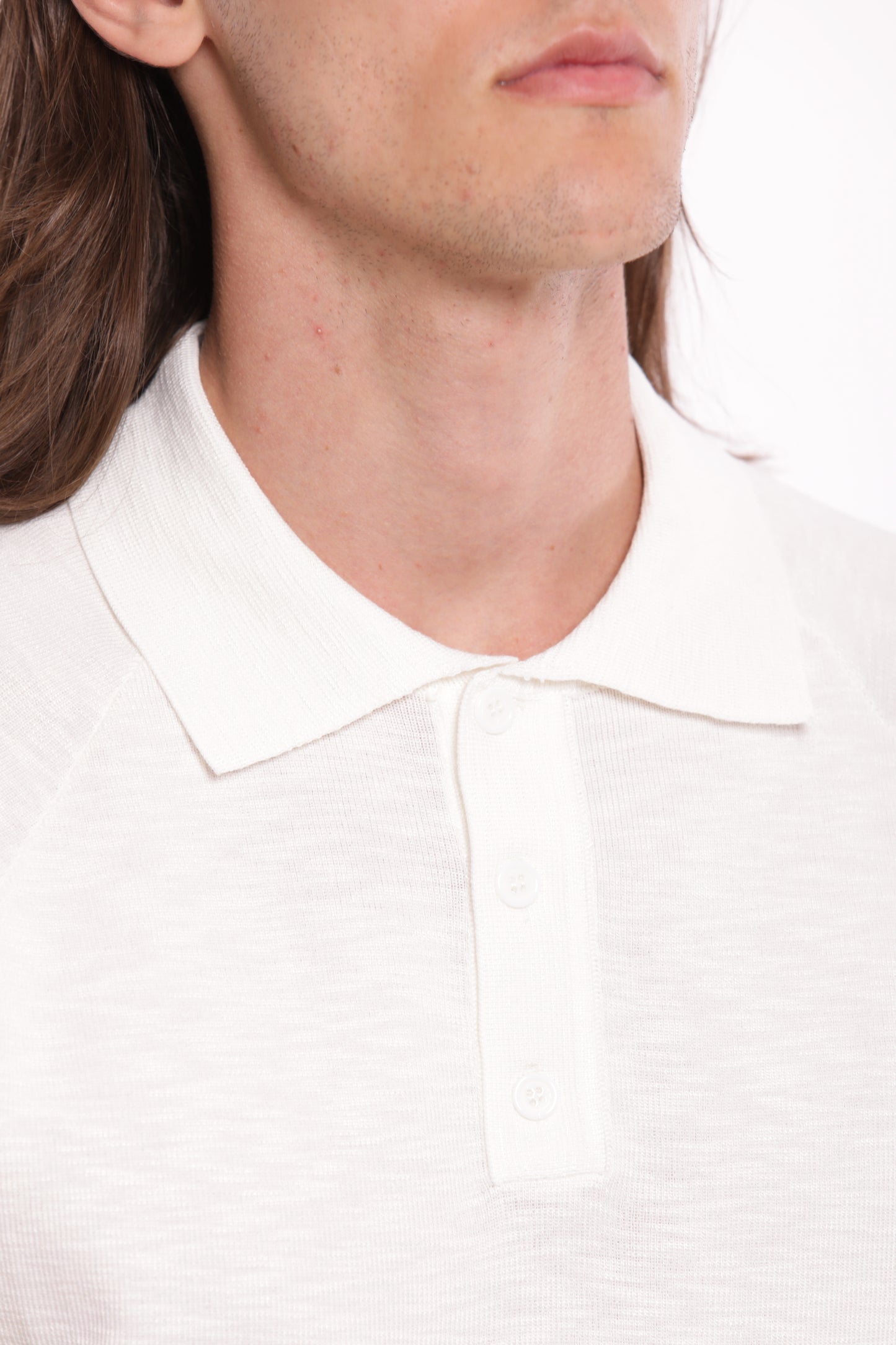 POLO IN MAGLIA CON BOTTONE