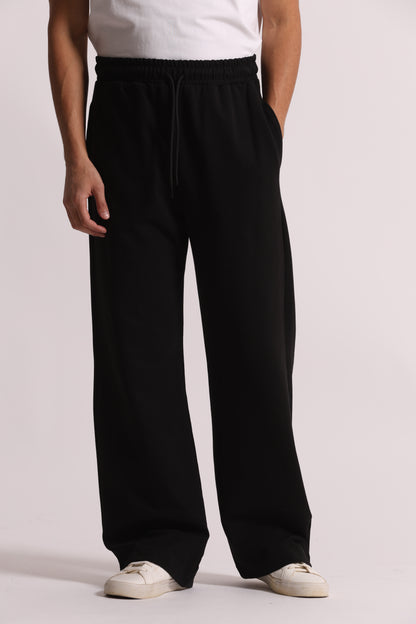 PANTALONI TUTA A GAMBA LARGA