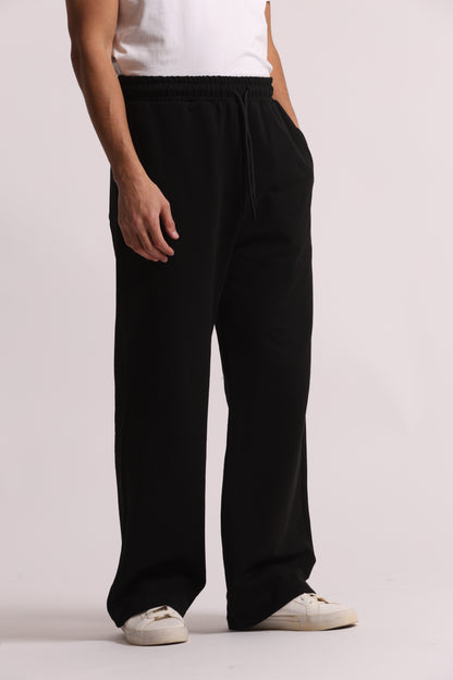 PANTALONI TUTA A GAMBA LARGA
