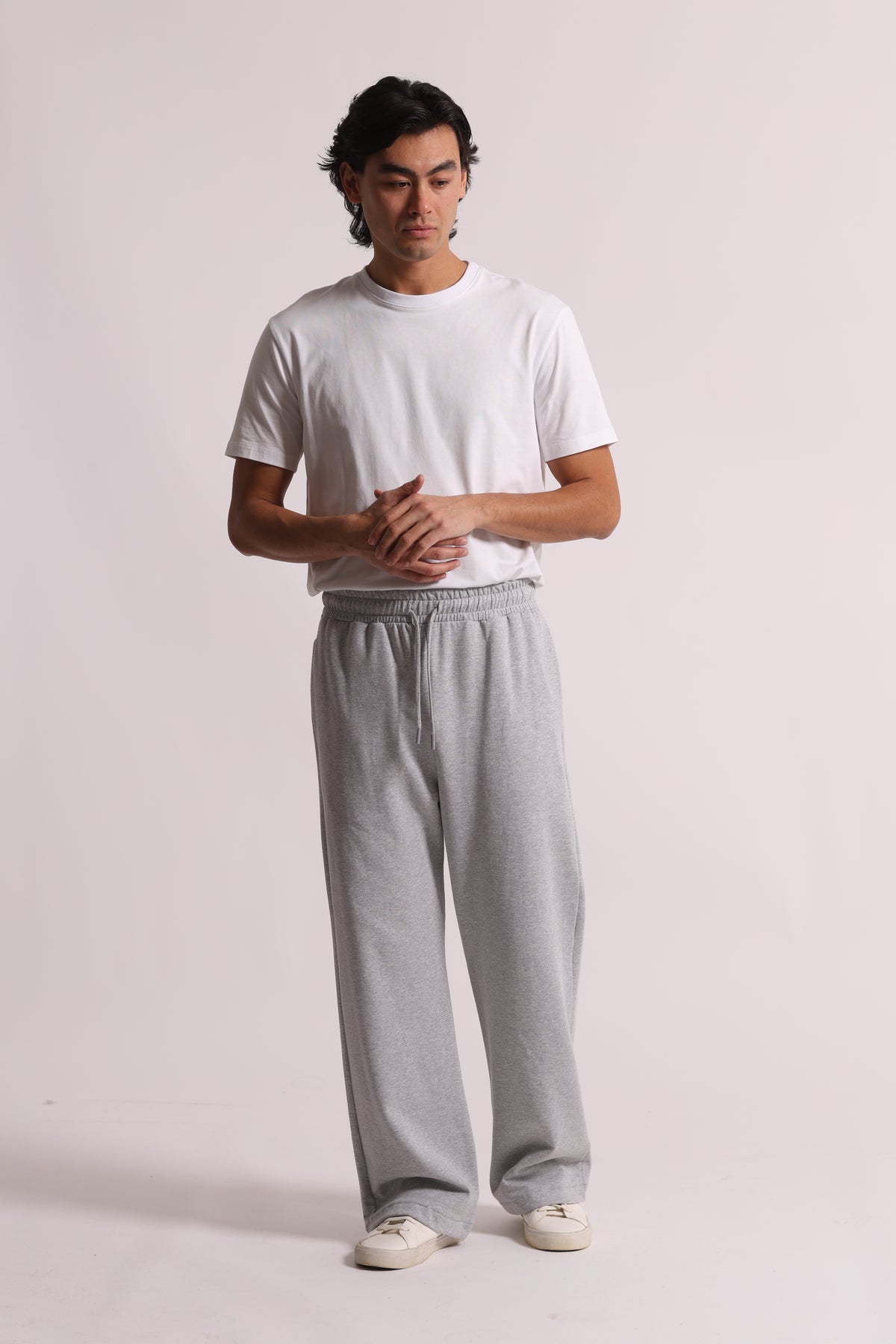 PANTALONI TUTA A GAMBA LARGA