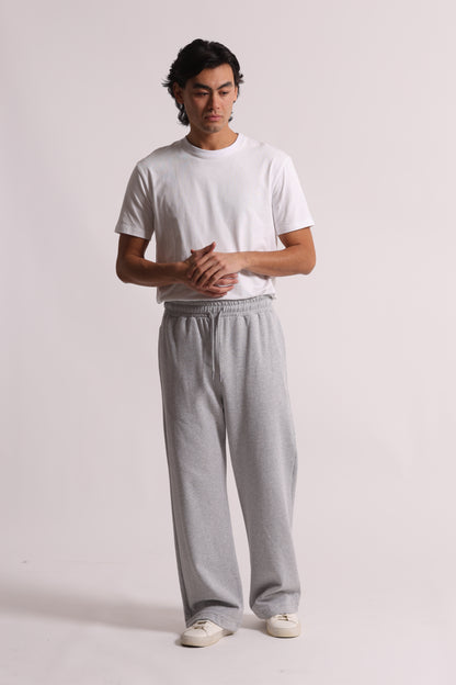 PANTALONI TUTA A GAMBA LARGA