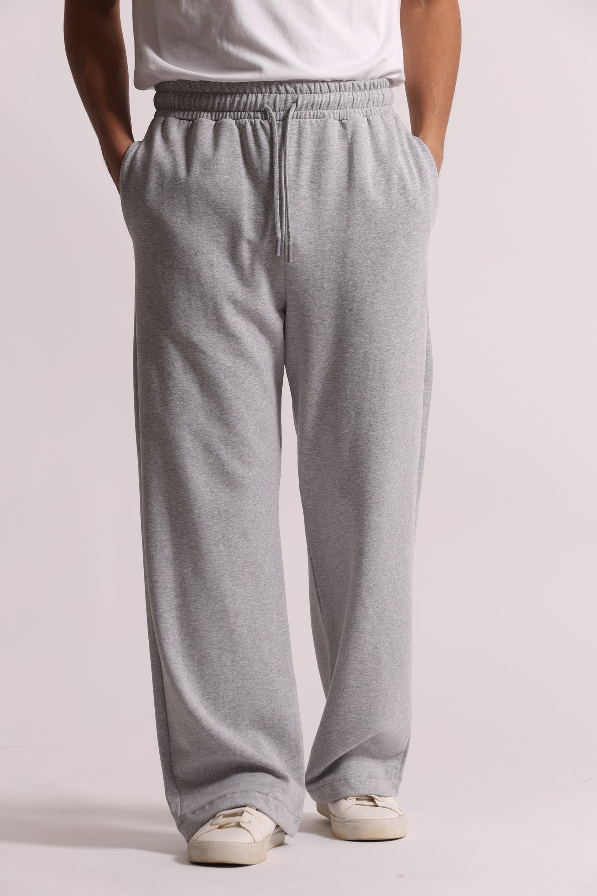 PANTALONI TUTA A GAMBA LARGA