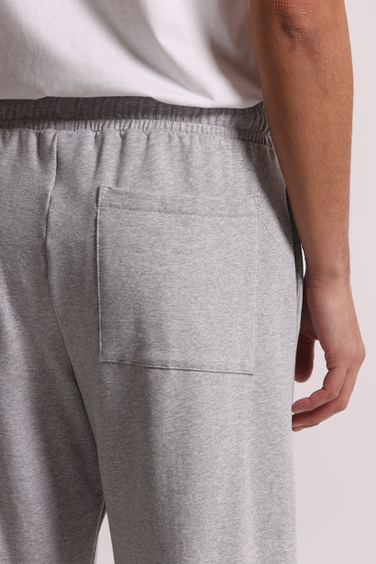 PANTALONI TUTA A GAMBA LARGA