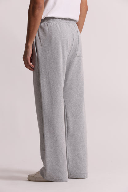 PANTALONI TUTA A GAMBA LARGA
