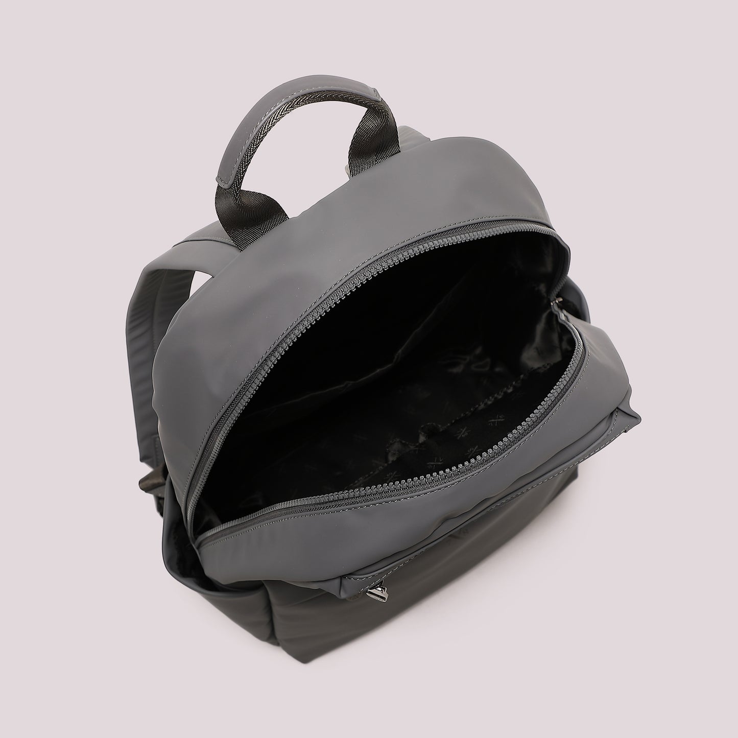 ZAINO GOMMATO IN TINTA UNITA